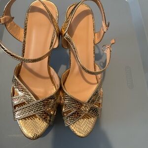 Gold Stiletto heels used once